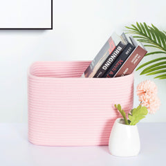 MINTWOOD Design woven cube bins organizing books on shelves.