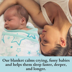 Miracle Blanket swaddle wrap cotton fabric detail pink highlights breathable material and soft touch.