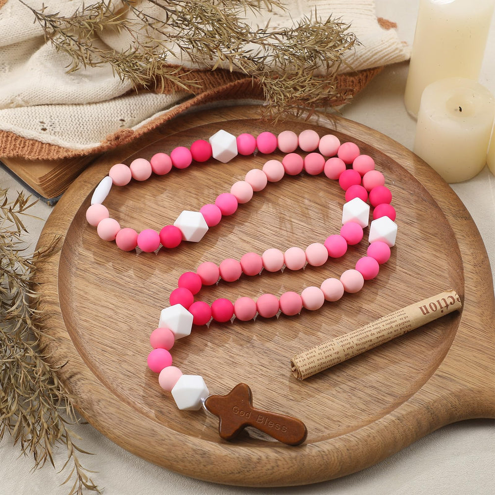 Misdary baby rosary with pink silicone beads offers a soft, safe sensory toy.