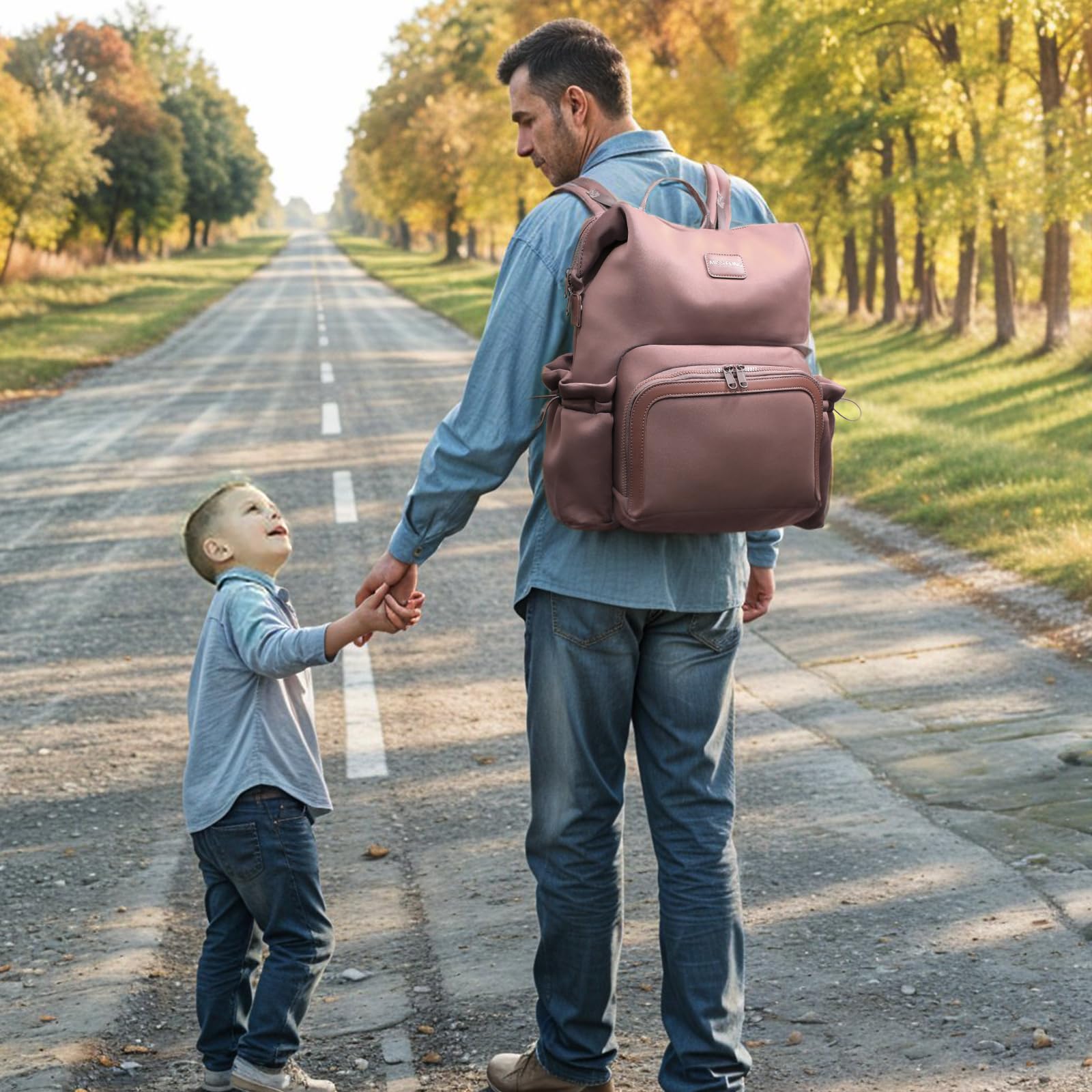 Miss Fong diaper bag backpack changing pad included for on-the-go changes.