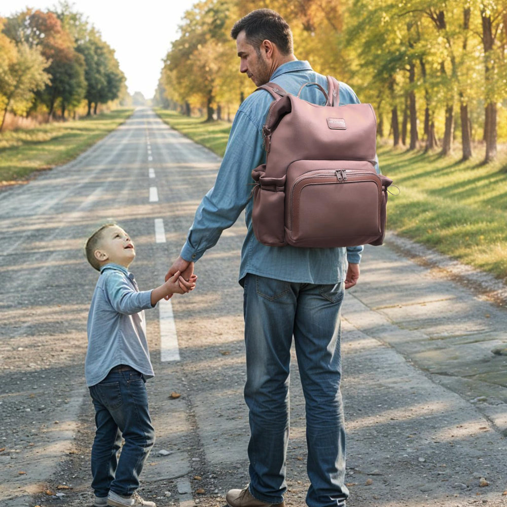 Miss Fong diaper bag backpack changing pad included for on-the-go changes.