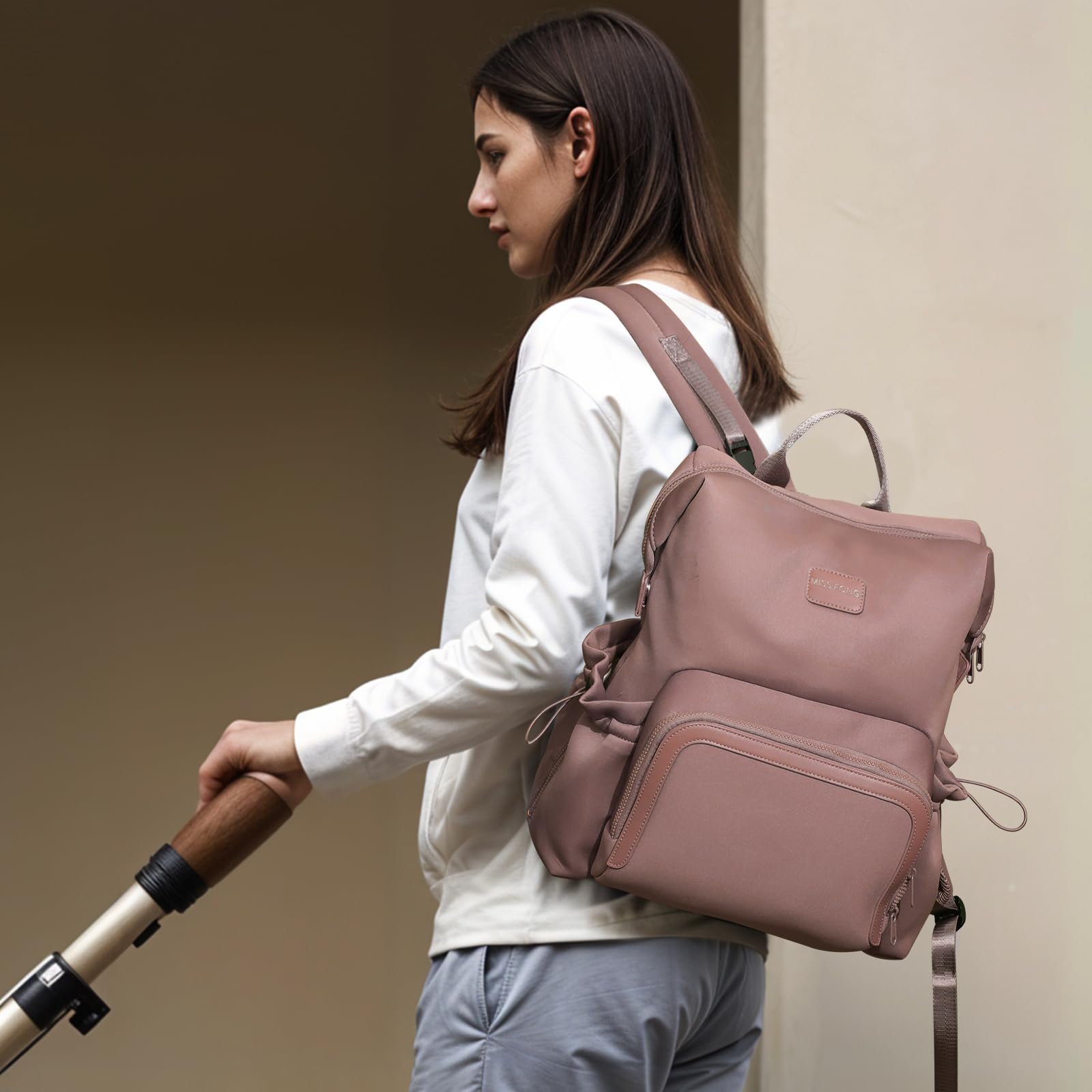 Miss Fong diaper bag backpack lightweight design for easy carrying.