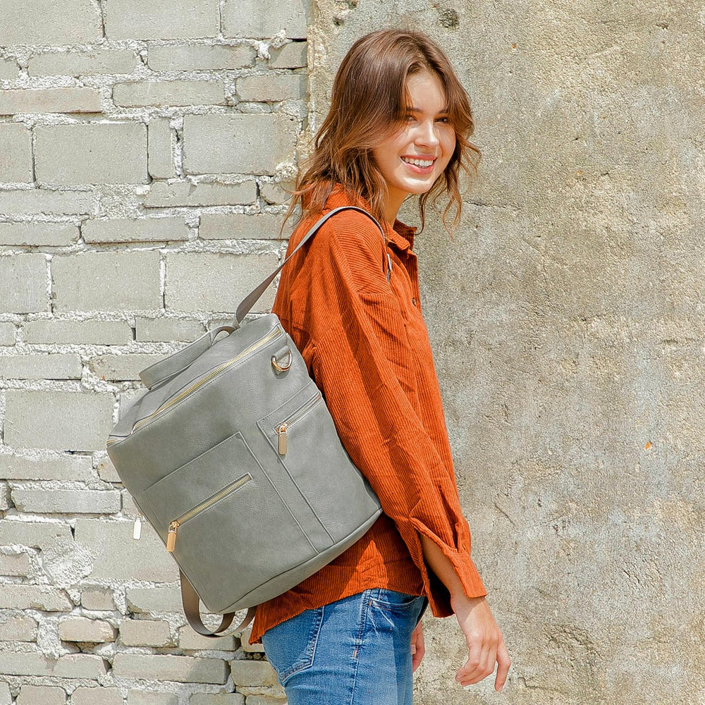 Miss Fong multi-pocket design keeps wallets wipes and keys organized.