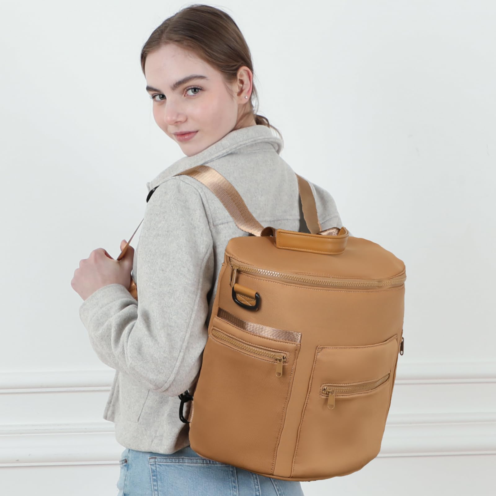 Convertible strap on Miss Fong diaper bag allows multiple carry styles