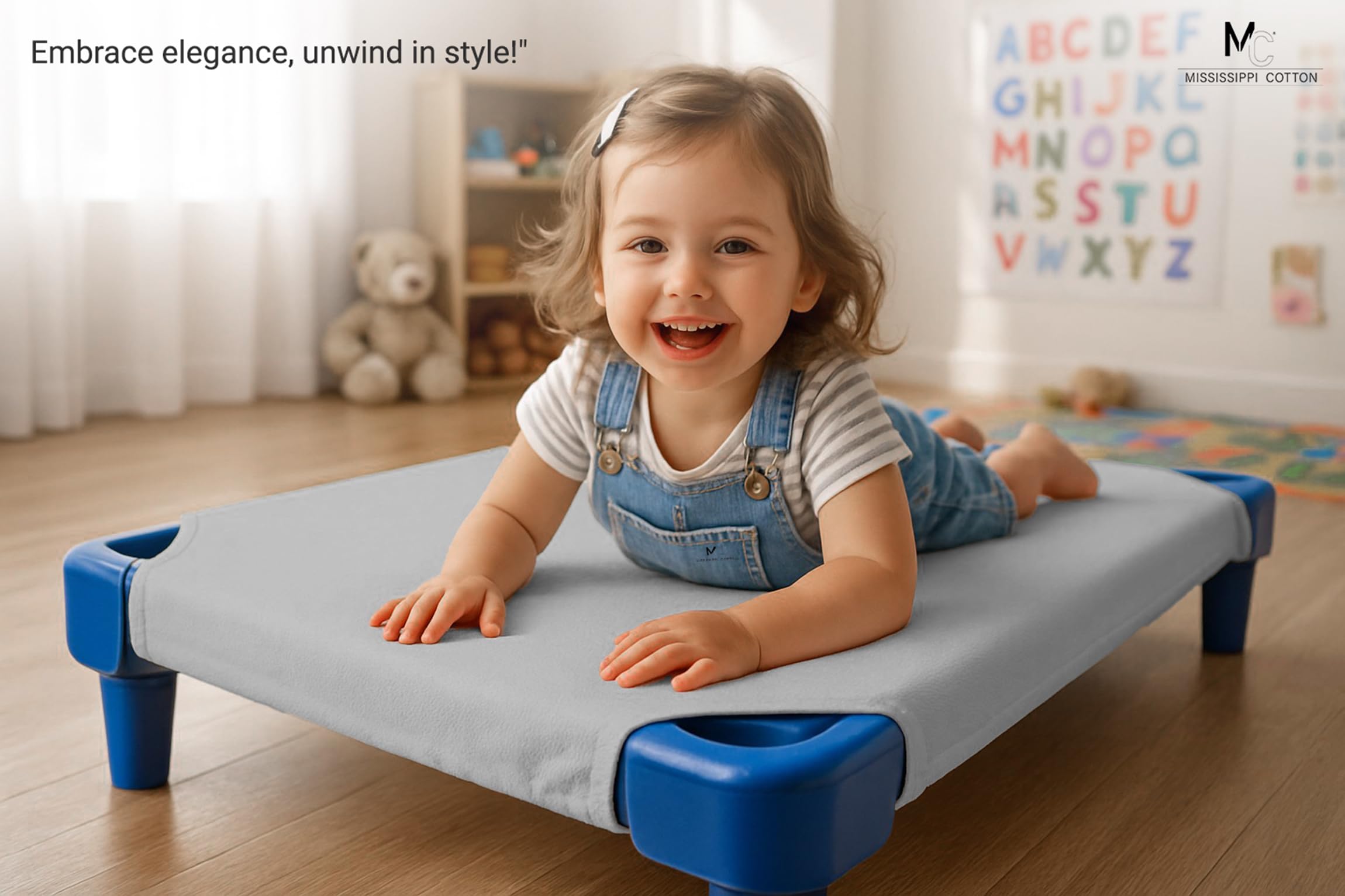 Mississippi Cotton pack6 cot sheet demonstrating corner elastic strap for secure nap-time fit.
