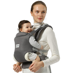 Misswisdom baby carrier with crossed shoulders and lumbar support for balanced comfort.