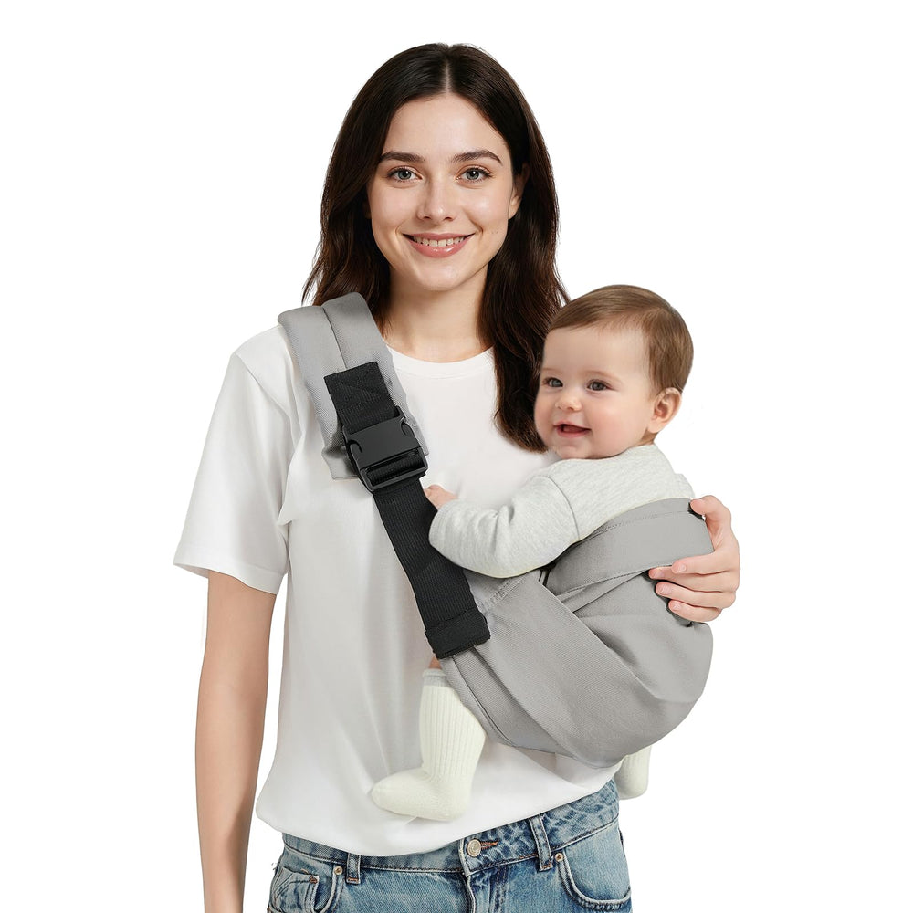 MISSWISDOM baby sling on a model in front carry position in grey for secure daily use