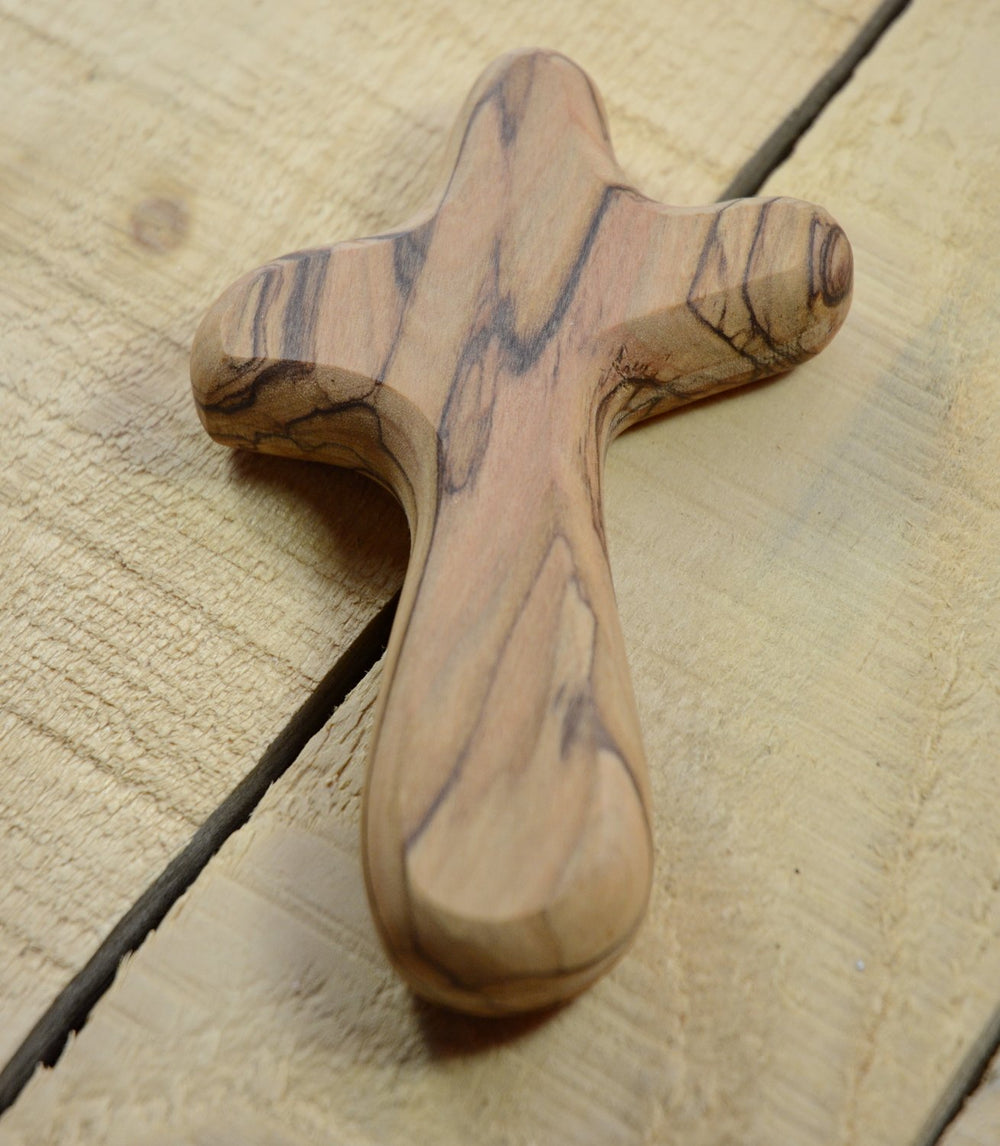 MIZZE Bethlehem olive wood grain enhances this meaningful keepsake.
