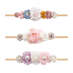 mligril baby headband with flower bows for a cozy, secure fit on newborns and infants.