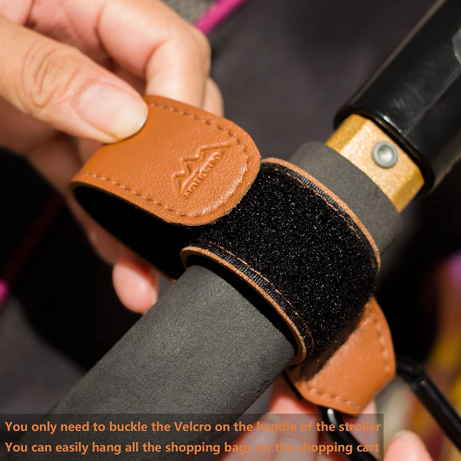 MoBearer stroller hook keeps diaper bags within reach during shopping trips.