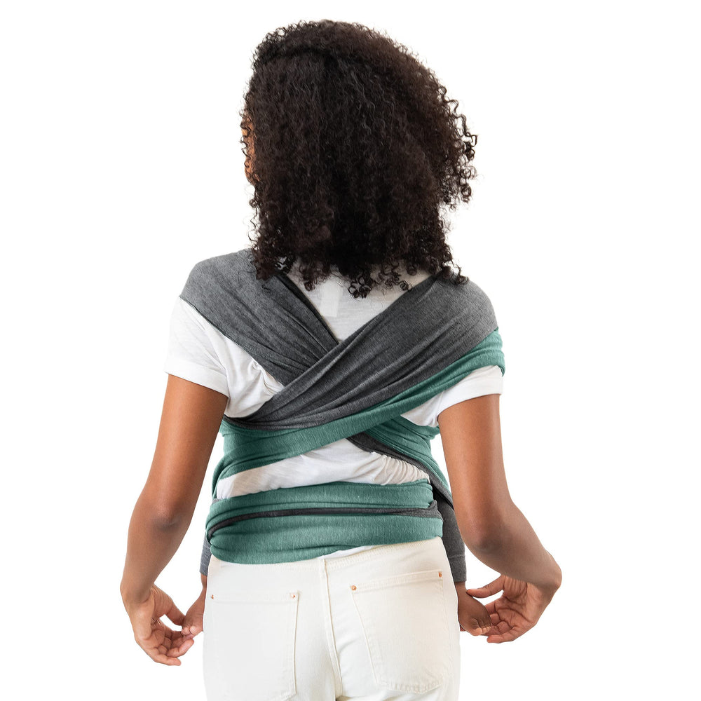 Moby Wrap Reversible hip hold with growing baby