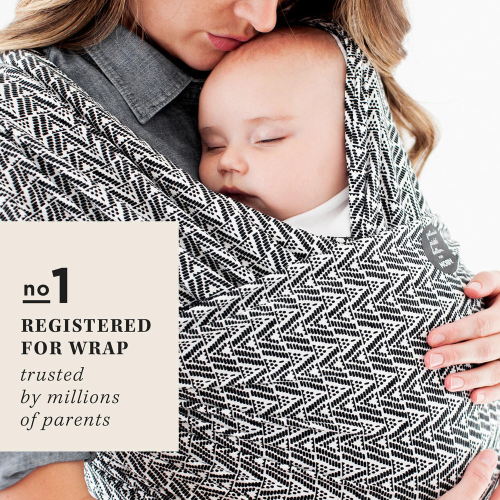 Moby Evolution Wrap hands-free on-the-go moment during a stroll.