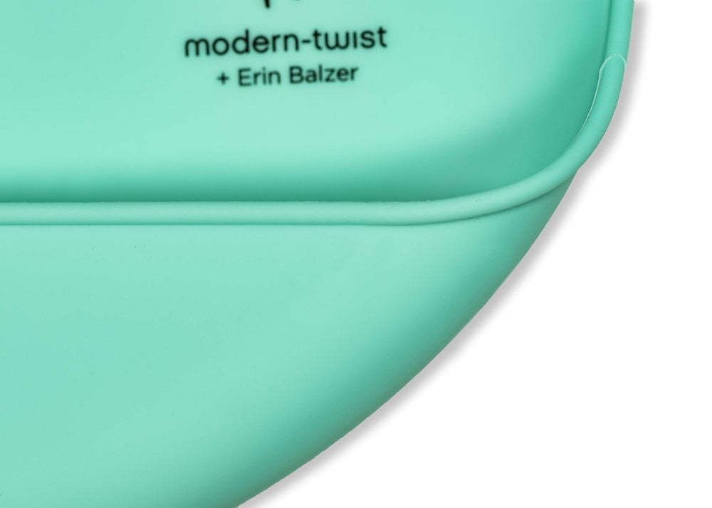 Modern Twist Bucket Bib is dishwasher-safe for quick cleaning.