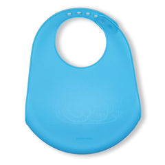 MODERN-TWIST bucket bib rolled up for compact storage and travel