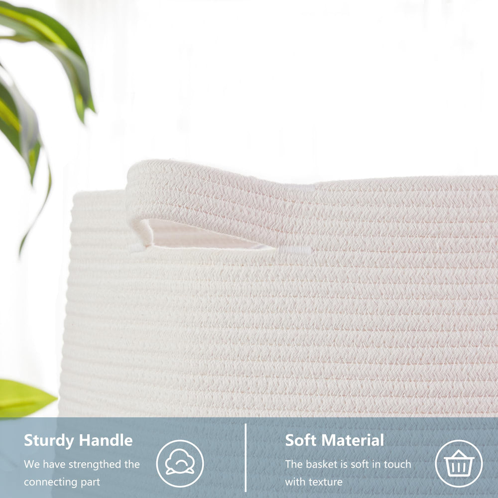 MOJOSCEND pink laundry hamper tucked beside a bed for blankets