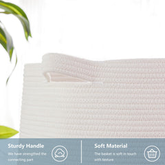MOJOSCEND pink laundry hamper tucked beside a bed for blankets