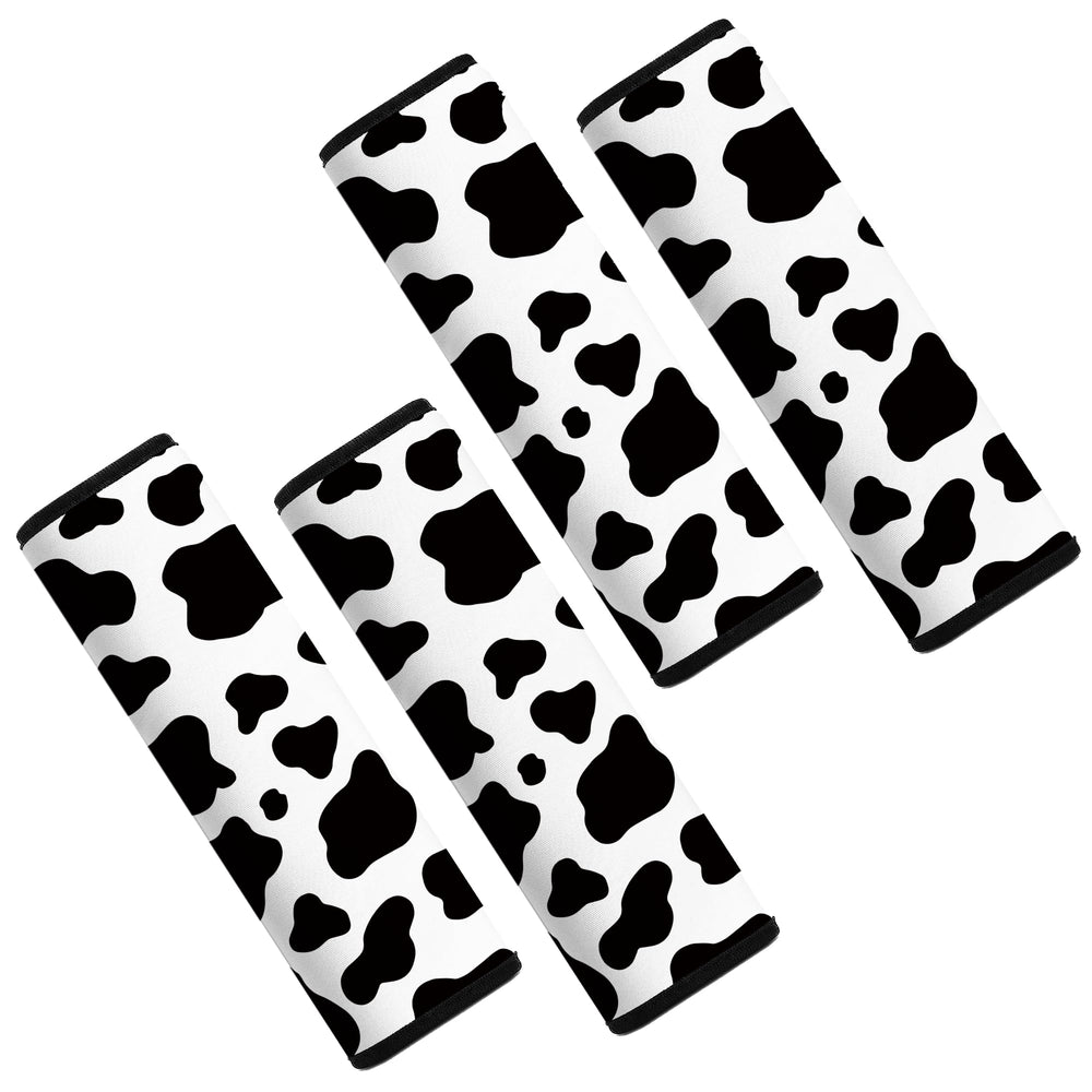 Mokiwala cow-pattern car seat belt pad cover seen from the front for comfortable cushioning.