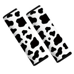 Mokiwala cow-pattern seatbelt pad close-up on soft neoprene for comfort