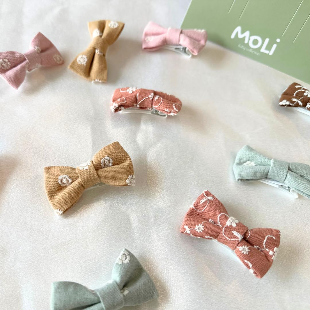 MoLi Baby Collection dusty rose bow clip, soft embroidery adds charm