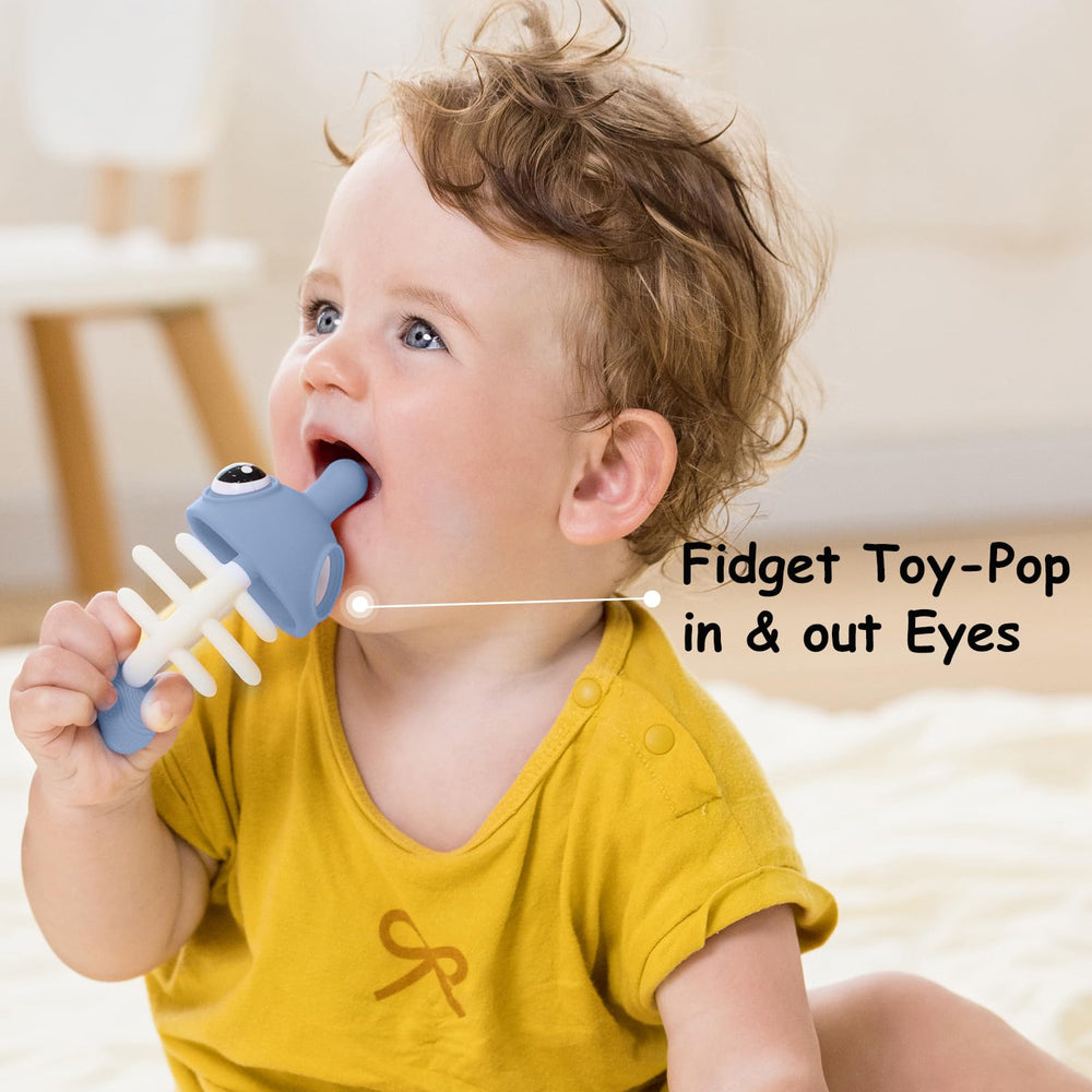 Mombella silicone teether for gums massage during teething sessions.