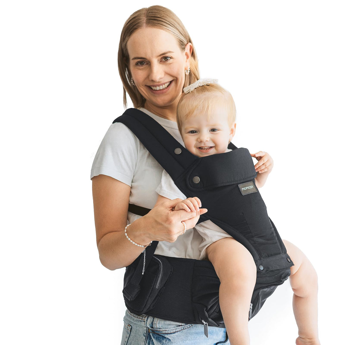 Momcozy baby carrier with hip seat for hands-free exploration.