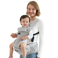Momcozy baby carrier with hip seat—ergonomic alignment for comfortable hip support during outdoor walks.