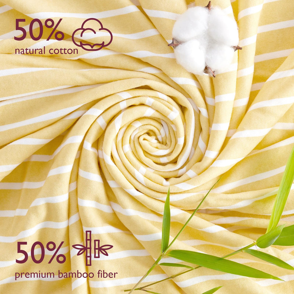 Momcozy hooded towel in Lemons pattern adds bright charm while absorbing moisture efficiently.