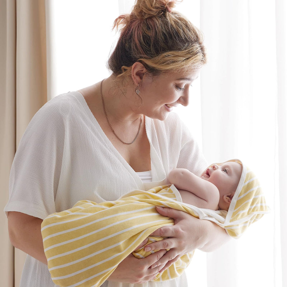 Momcozy unisex colors towel supports easy matching with nursery decor and siblings.