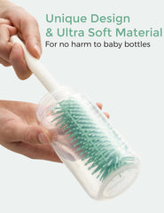 Momcozy bottle brush set nipple brush in use for small parts cleaning.