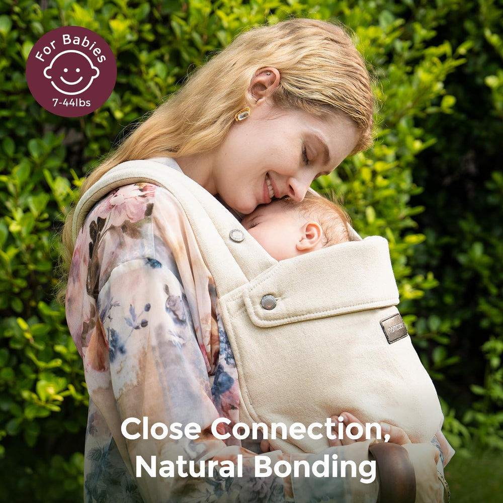Momcozy carrier demonstrates three-stage adjustment for growing babies.