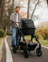 Momcozy ChangeGo carrycot extendable sun canopy protecting baby from sun