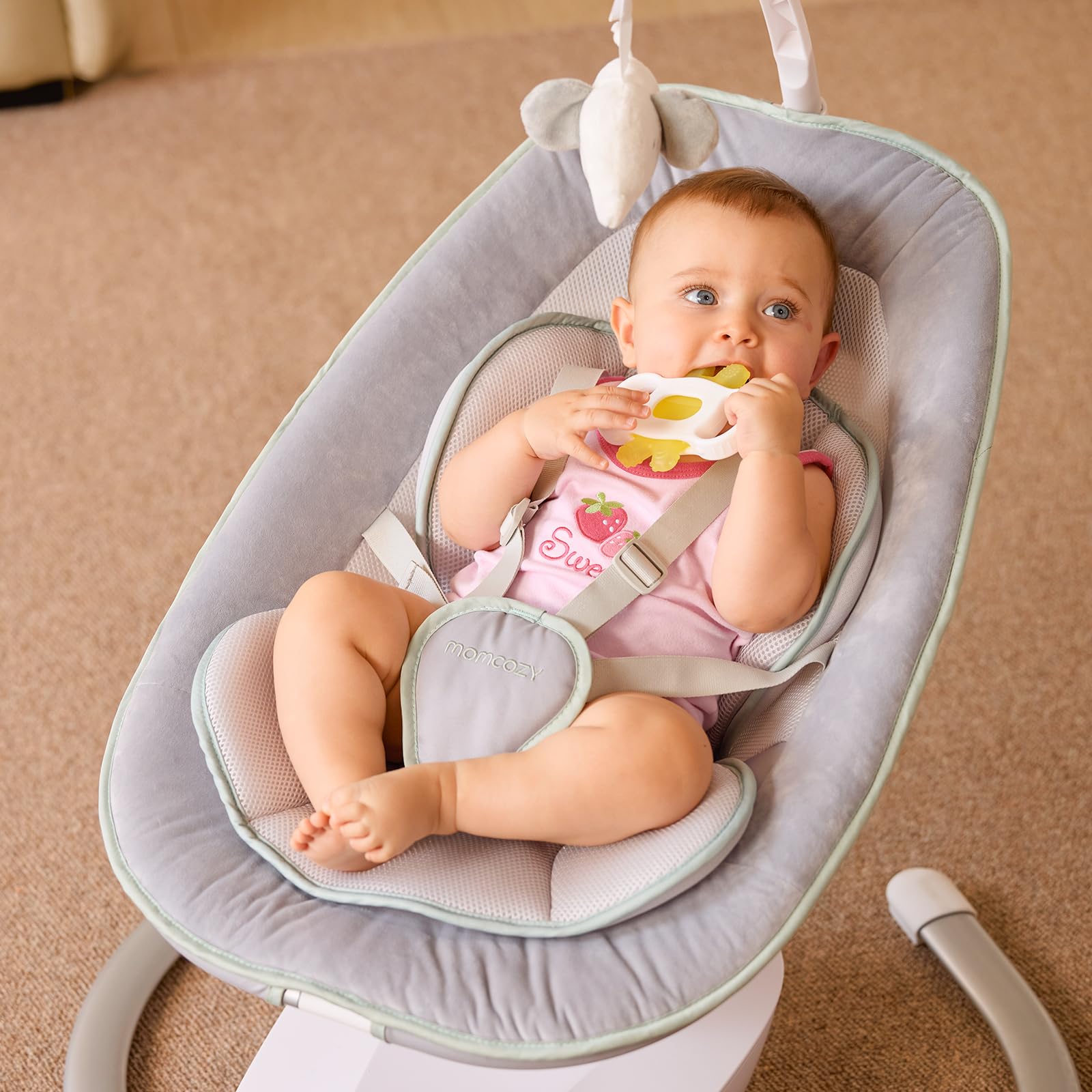 Momcozy CocoSway removable, machine-washable seat pad for easy cleaning.