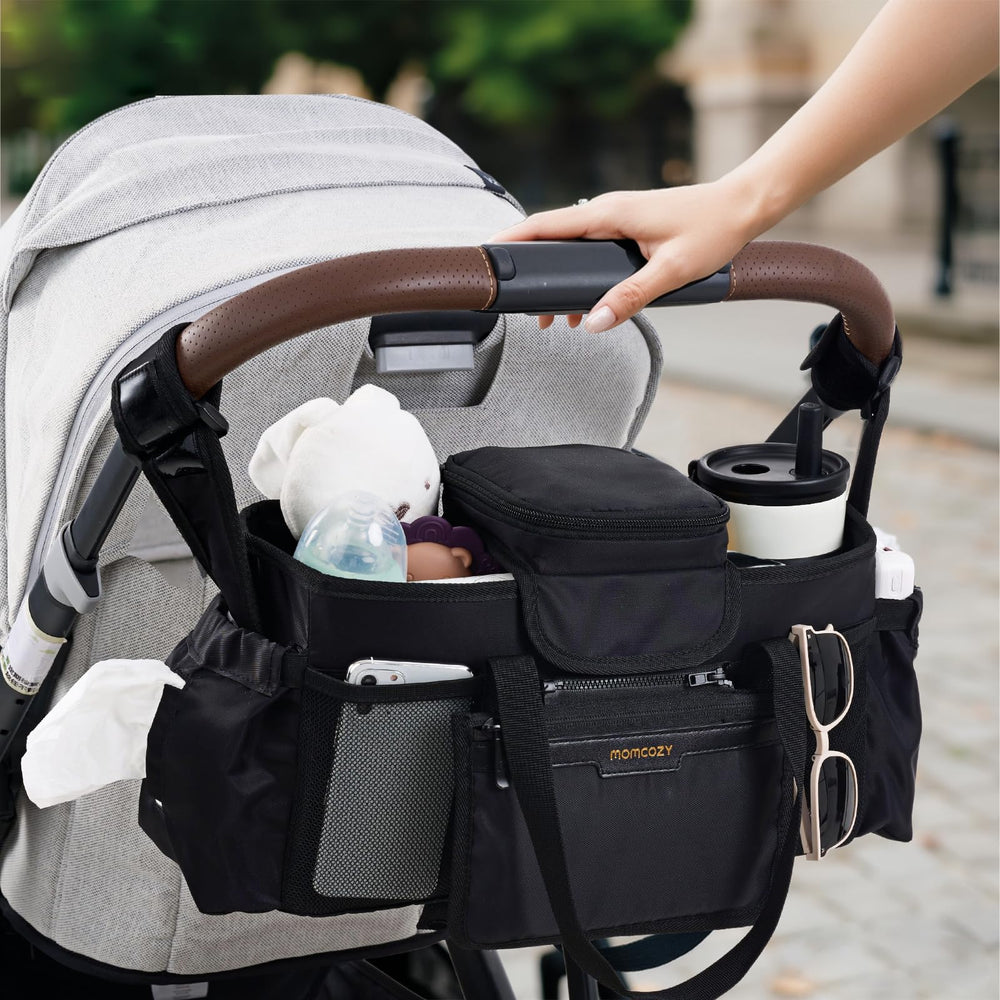 Momcozy Extra Large Stroller Organizer Max mesh pocket for phone and tissues.