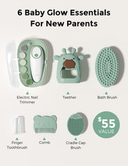 Momcozy Glow Baby Kit bath brush with soft silicone during bath time.