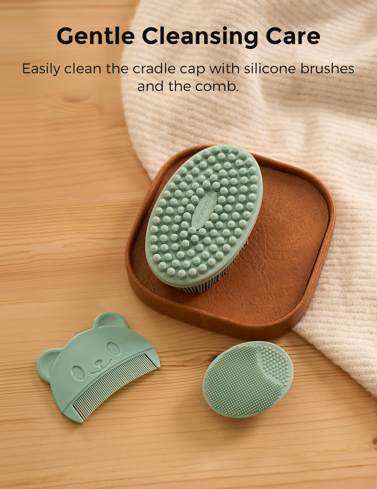 Momcozy Glow Baby Kit curved comb protects delicate hair.