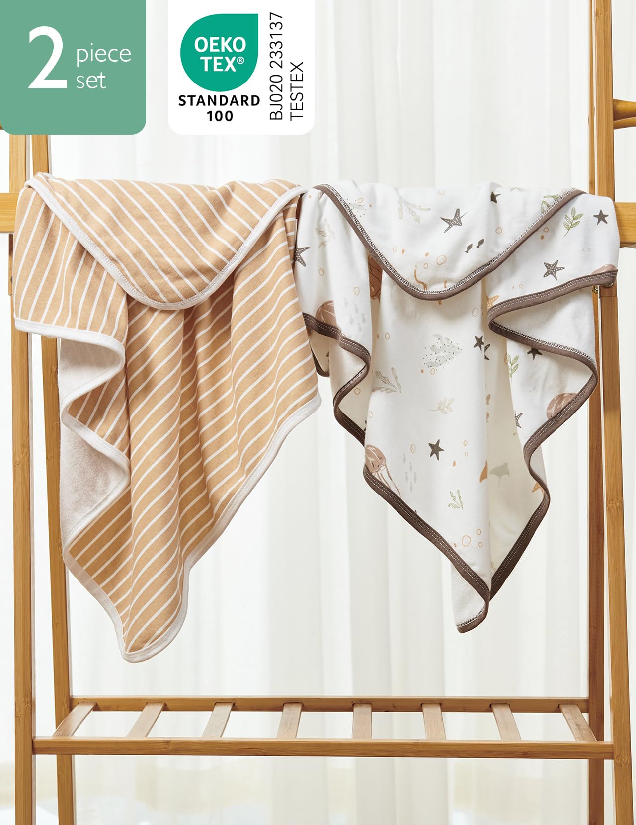 Momcozy hooded towel Leaves pattern keeps baby warm and dry after bath.