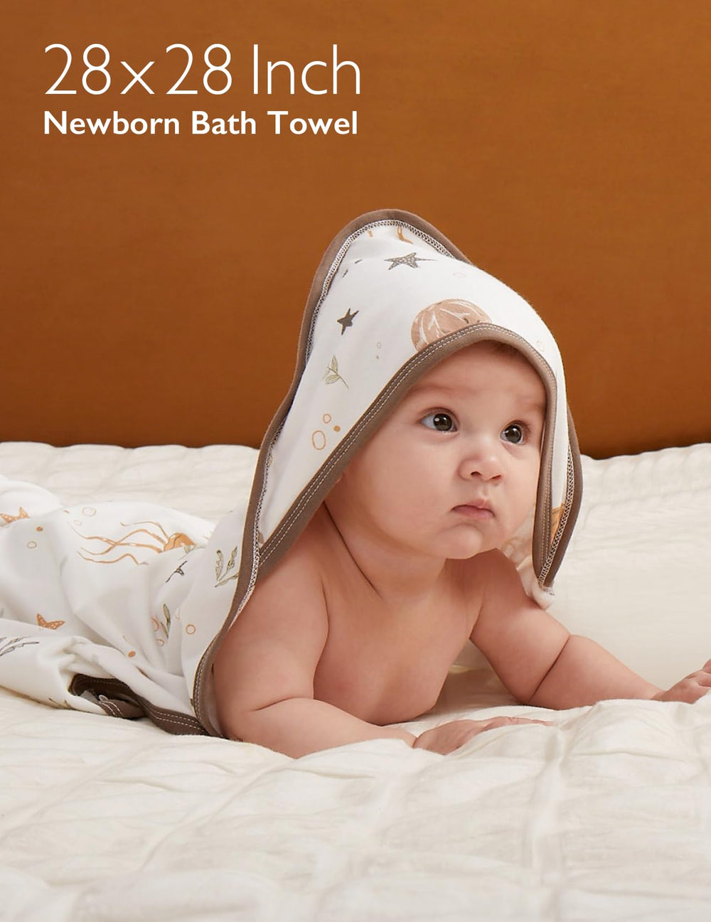 Momcozy towel material close-up highlights viscose-cotton blend for soft touch.