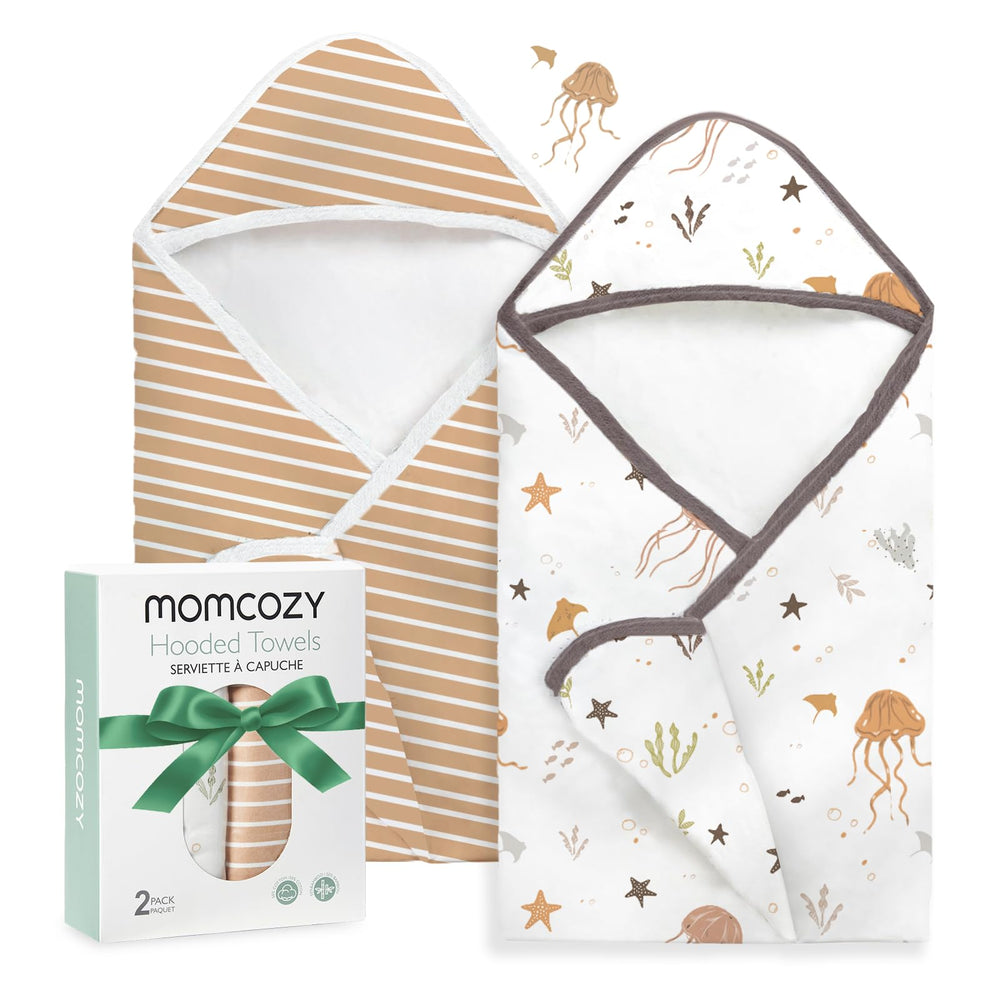 Momcozy hooded baby towel Ocean Whimsy pattern offers cloud-soft warmth after bath.