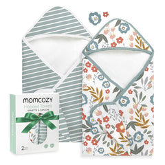 Momcozy hooded baby towel in Petite Blossom wraps infants in warmth after bath.