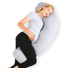 Momcozy J-shaped pregnancy pillow providing full-body support for side sleepers.