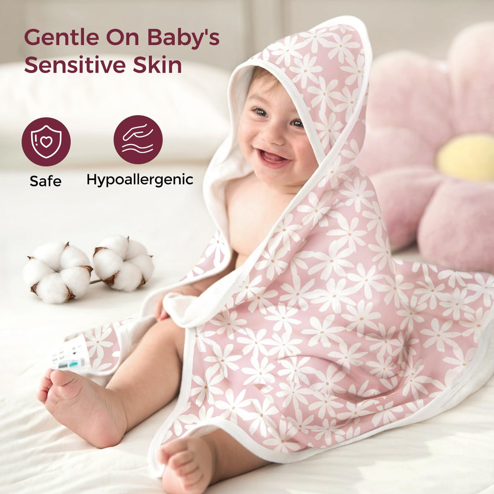 Momcozy Leaves Design Baby Towel vibrant print supports sensory development.