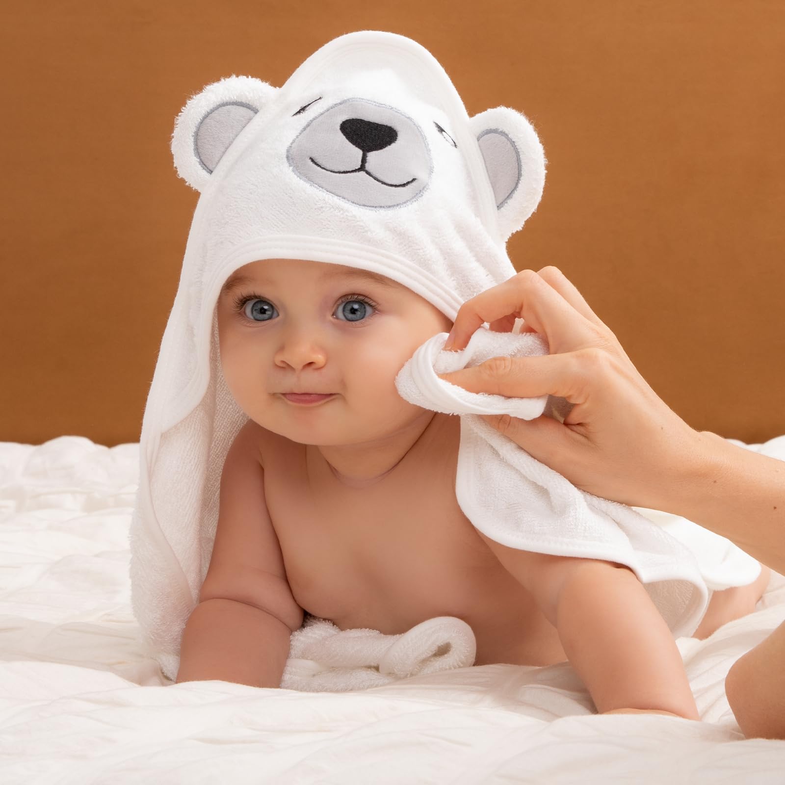 Machine-washable Momcozy hooded towel stays soft after many washes.