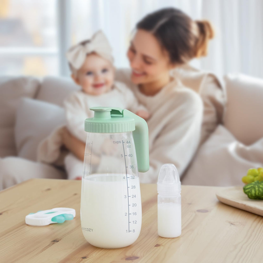 Momcozy multi-use pitcher suitable for formula, juice, or tea