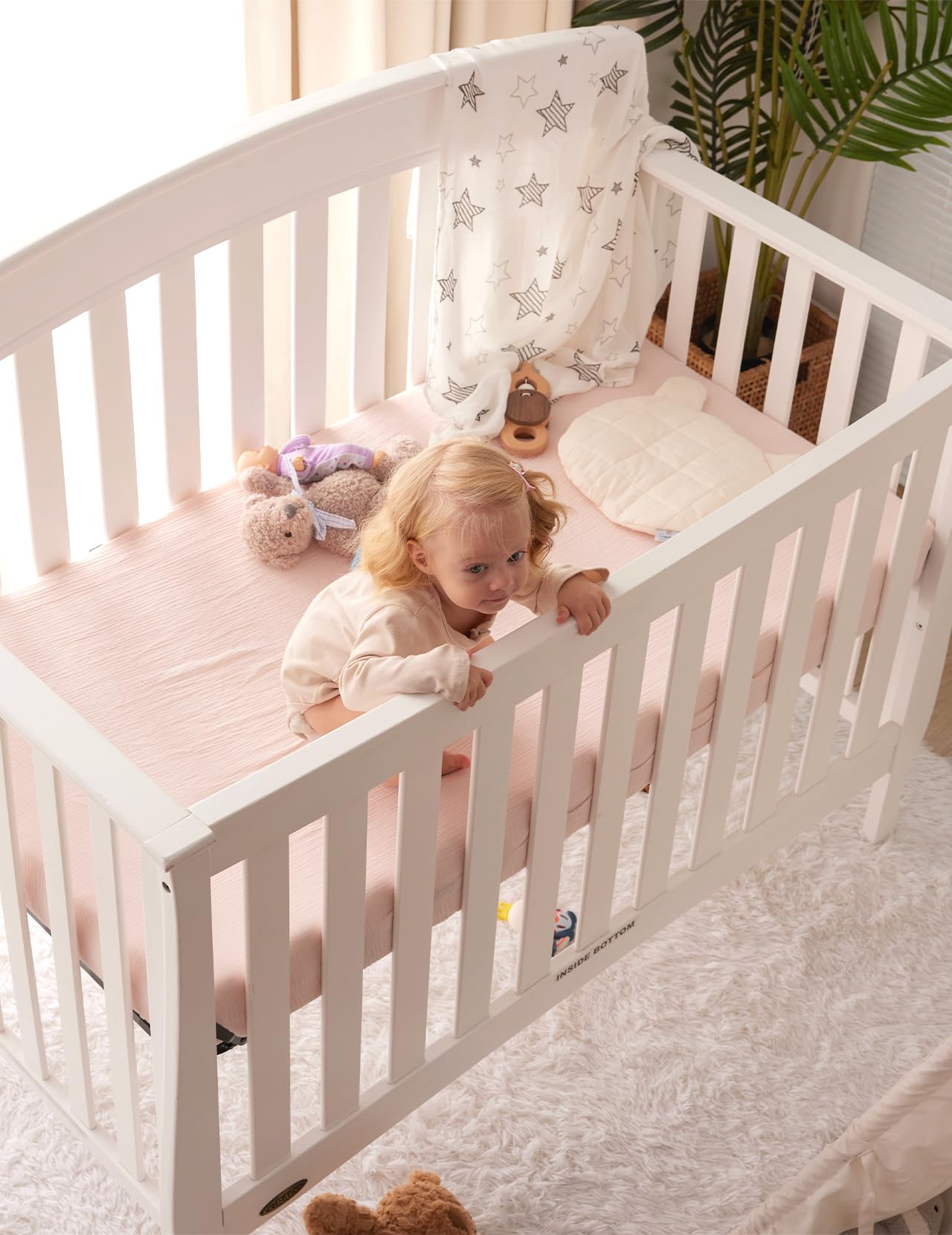 Momcozy Muslin Mini Crib Sheets offer color variety for gender neutral rooms