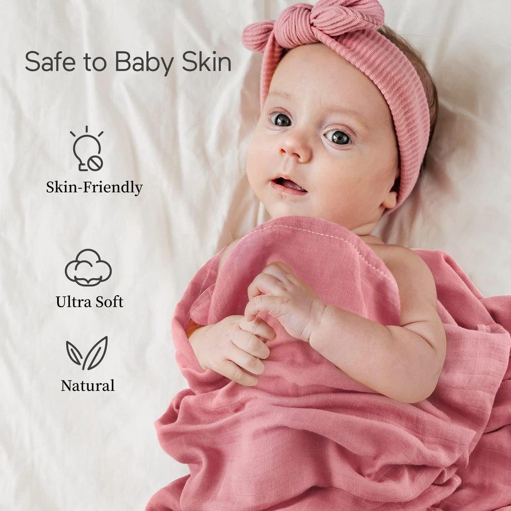 Momcozy muslin swaddle blanket multi-use for diaper pad, burp cloth, or cover.
