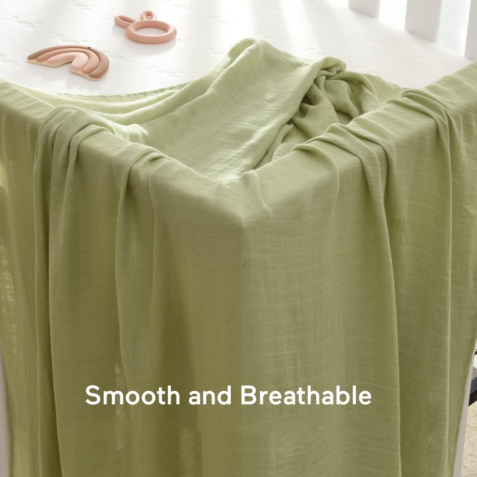 Momcozy muslin swaddle blanket neutral earth tones ideal for boy or girl.