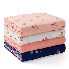 Momcozy muslin swaddle blanket showing soft texture for newborn comfort
