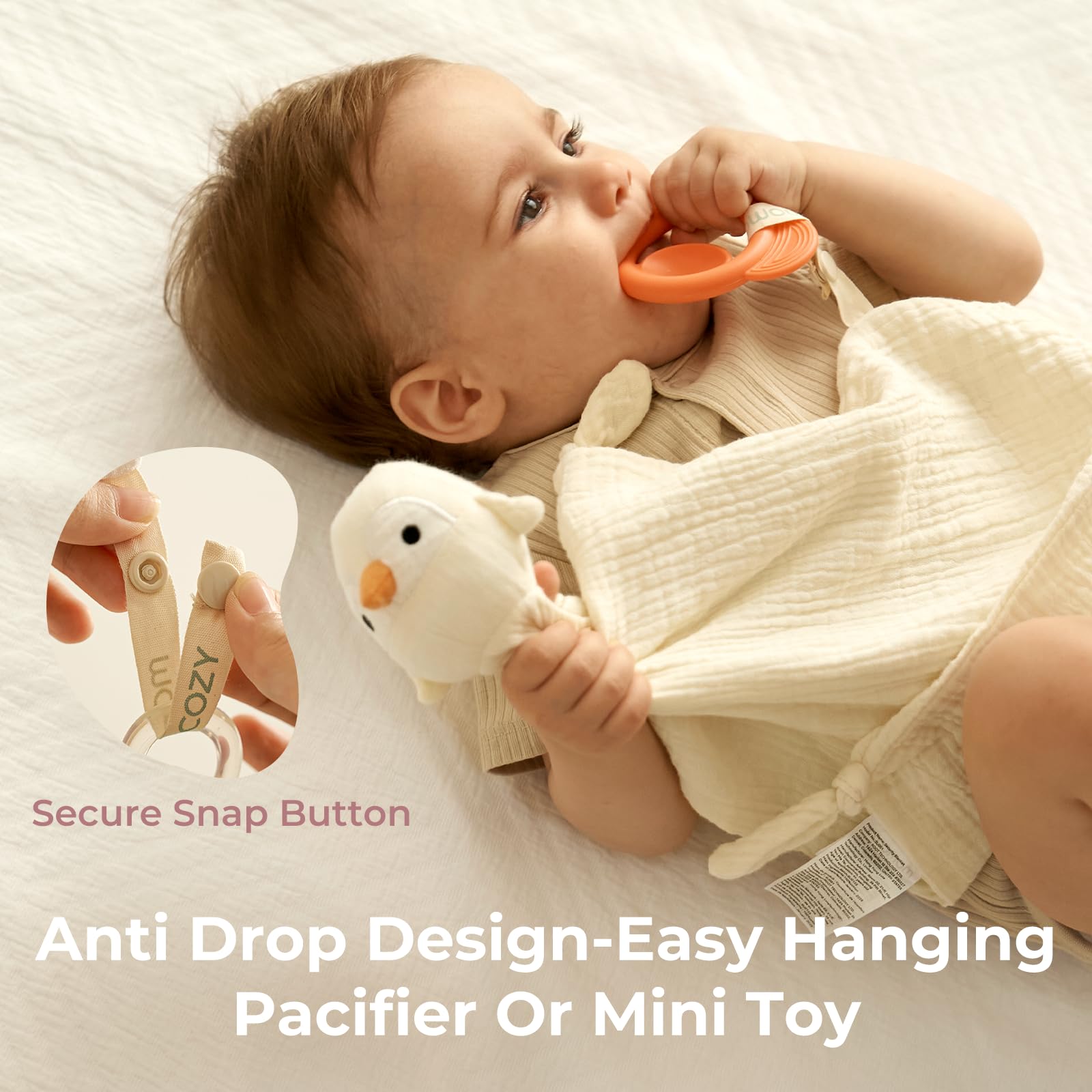 Momcozy Penguin Lovey yellow knotted corners; encourages tactile play and exploration.
