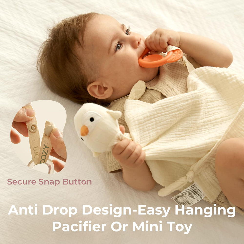 Momcozy Penguin Lovey yellow knotted corners; encourages tactile play and exploration.