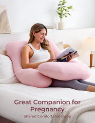 Momcozy pink belly-support pillow cradles belly to relieve pressure.